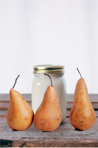 Image of a jar of yogurt and 3 golden pears