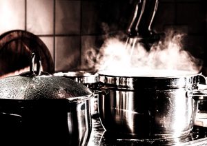 Image of steaming pots on the stove